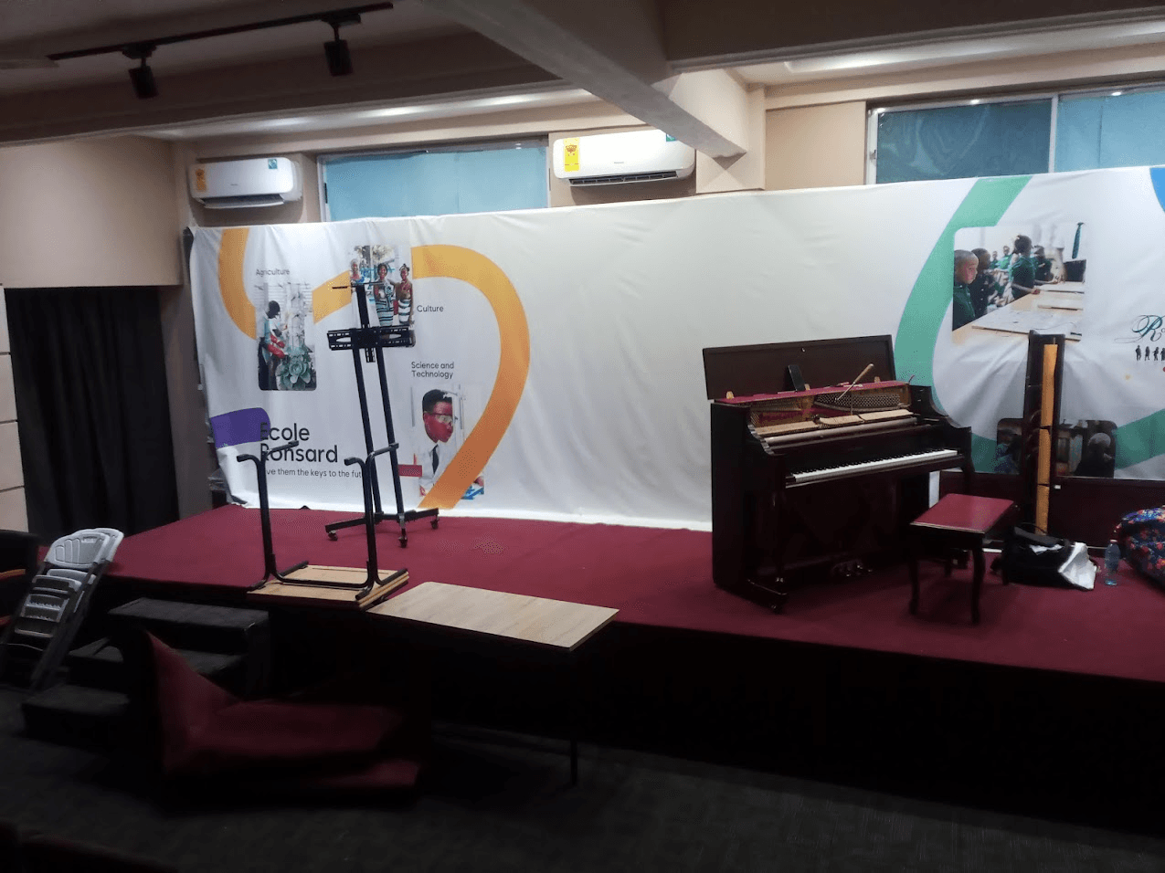 Upright piano on a stage